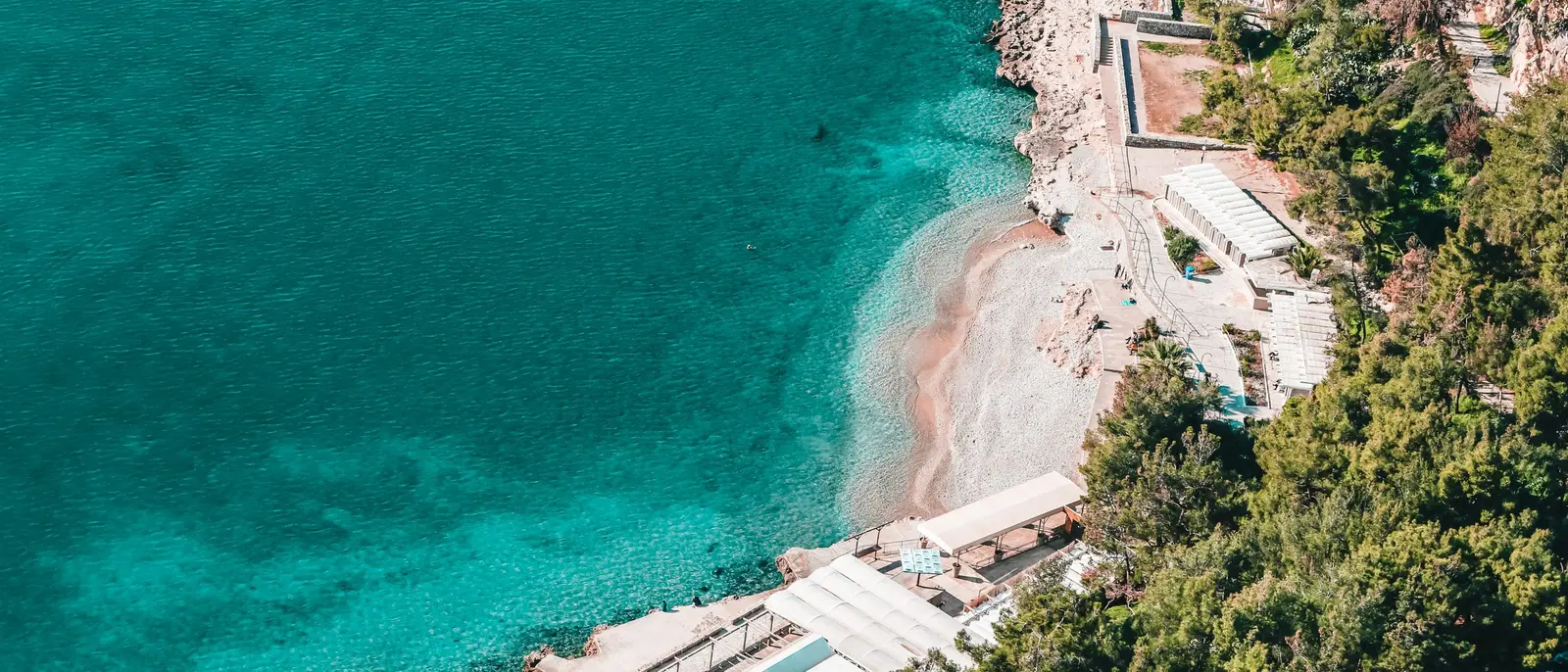 Turquoise water and a beach on the Greek coast